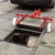 Hydraulic Manhole Cover Lifter with Spreader Bars